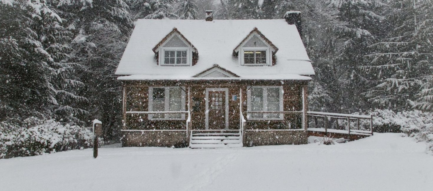 House covered in snow in winter